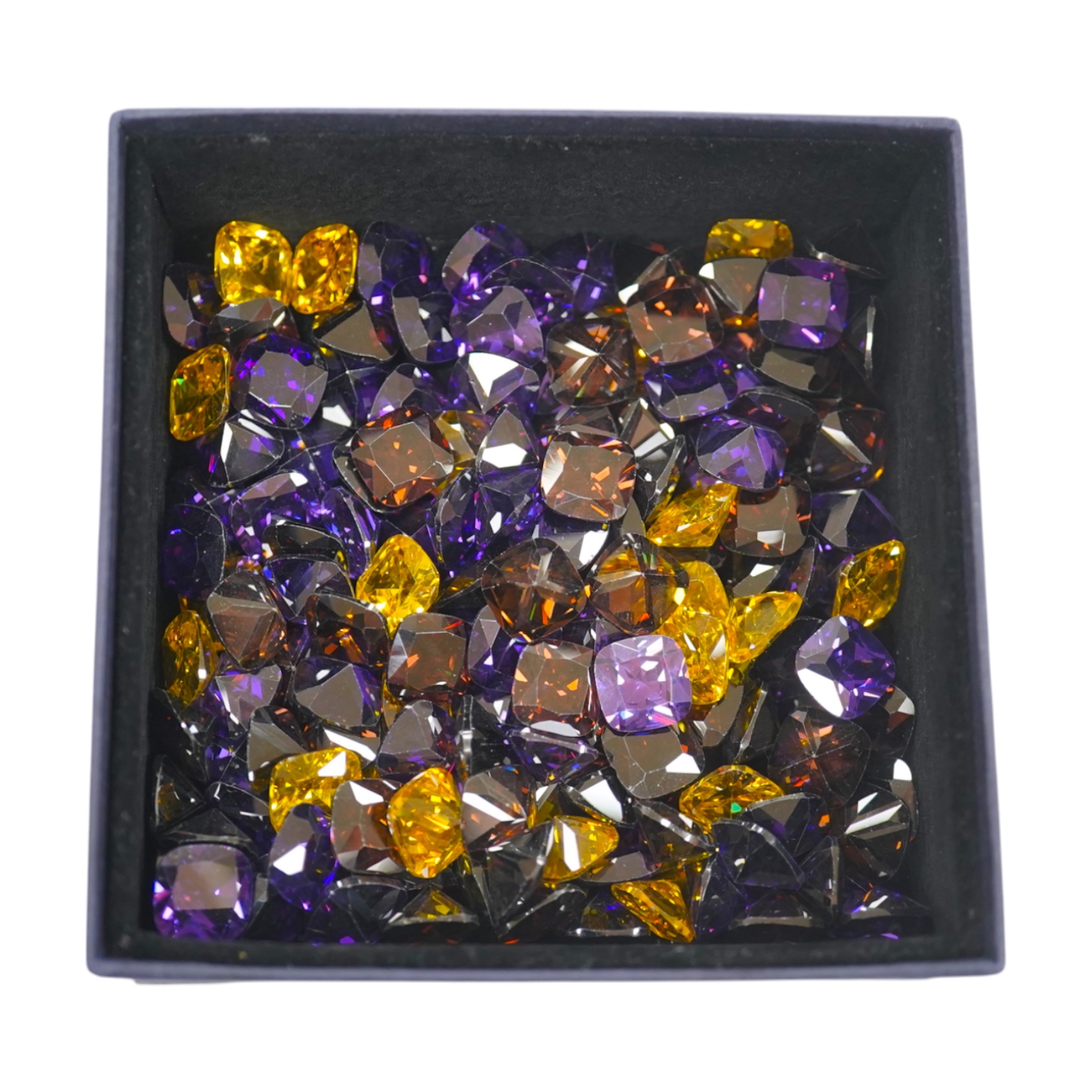 A quantity of assorted cut coloured cubic zirconia stones. Condition - poor to fair to good